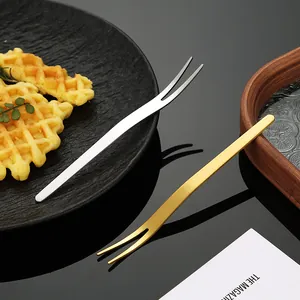 Premium stainless steel two-tine fruit forks for elegant dessert and cake presentation