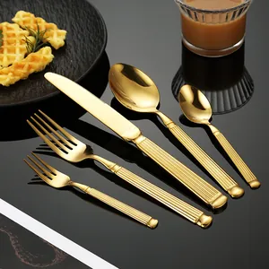 Elegant 304 stainless steel Roman column gold cutlery set including knife, forks, and spoons