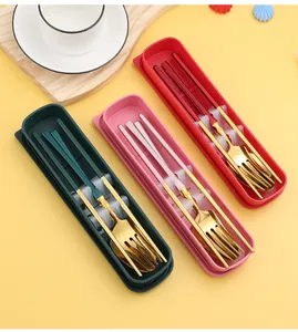 Detailed view of three colorful portable cutlery sets with gold-toned stainless steel.