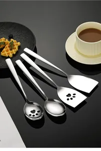 Detailed view of 304 stainless steel serving spoons and spatulas with cat paw cutout design