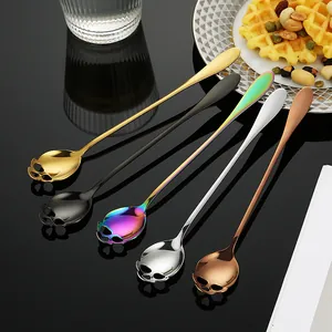 Set of 5 creative stainless steel skull spoons with long handles in various metallic finishes