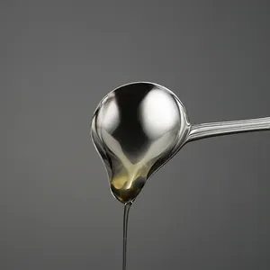 Stainless steel sauce ladle with pouring spout for precise kitchen drizzling