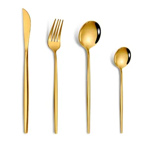 Elegant 4-piece gold stainless steel cutlery set with mirror finish on white background