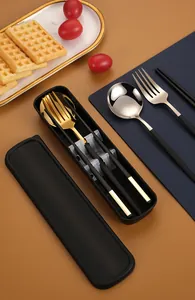 Close-up of portable 304 stainless steel cutlery set with a black storage case.