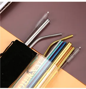 Colorful stainless steel straw set with cleaning brushes and black velvet storage bag.