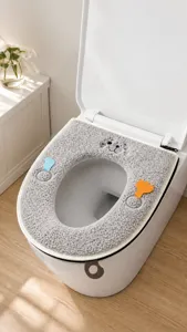 Copriwater in peluche grigio con simpatico disegno di orsetto e pratica chiusura a cerniera