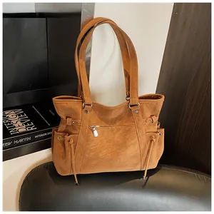 Bolso tote retro de cuero marrón con cordón y detalles de cremallera