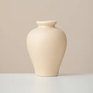 Minimalist beige ceramic flower vase for modern home decor ornament style