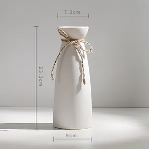 Modern white ceramic vase detail view with dimensions of 23.3cm height and twine bow