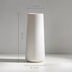 Technical drawing view showing dimensions of a modern white ceramic floral vase