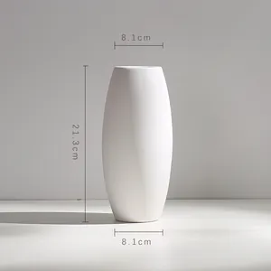 Minimalist white ceramic oval flower vase with dimensions 21.3cm height and 8.1cm width