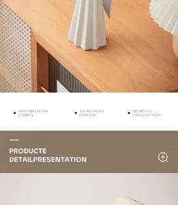 Detailed view of a minimalist white ceramic angel vase on a modern wooden sideboard