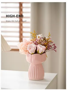 Elegant pink ceramic flower vase with a unique petal design for home interior decor