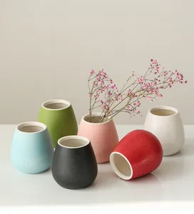Set of colorful mini ceramic vases for modern home decor and flower arrangement