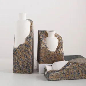 Wabi-sabi style ceramic vase set with artistic blue and gold stone texture for home decor.