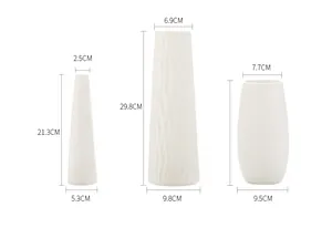 Size details of three white Nordic ceramic vases with minimalist textured surface