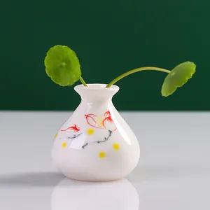 Minijarrón de cerámica blanca minimalista con diseño de peces pintado a mano para mesa de té
