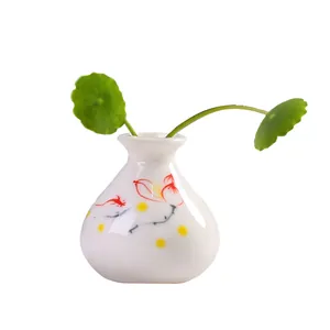 Elegante mini jarrón de cerámica con patrón de loto para decoración de mesa de té