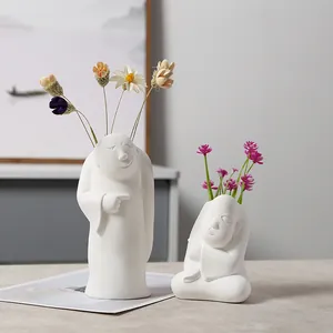 Handcrafted minimalist white ceramic character vases for modern home office desk decor