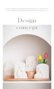 Nordic minimalist white ceramic vase set with embossed deer patterns in an arched niche
