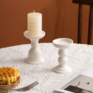 Modern white ceramic candle holders set for home decor and romantic candlelight dinner