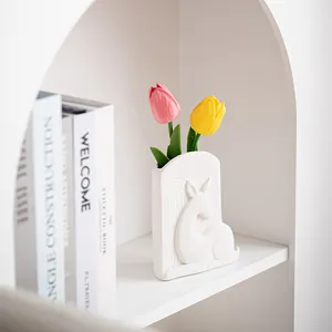 Elegant white ceramic deer vase with embossed pattern for minimalist home decor style