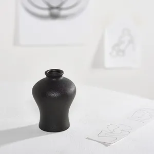 Minimalist black matte ceramic vase for modern home decor and dry flower arrangement