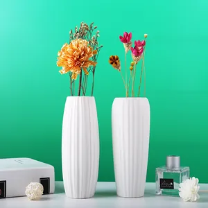 Modern minimalist white ceramic vases with vertical ribbed texture for home table decor