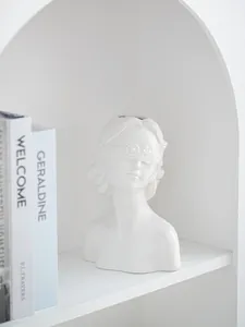 Nordic minimalist white ceramic human face bust vase for home decor
