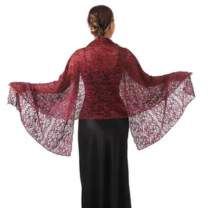 Back view of elegant burgundy lace shawl with rhinestones draped over evening gown