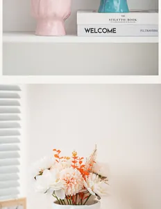 Detailed view of Nordic ceramic vase with elegant artificial flowers for home decor