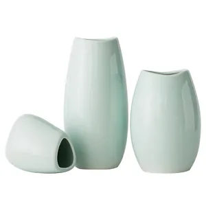 Elegante set di tre vasi in ceramica azzurra moderna per accessori decorativi minimalisti