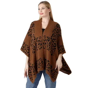 Stylish leopard print knit poncho shawl shown on model with soft textured finish