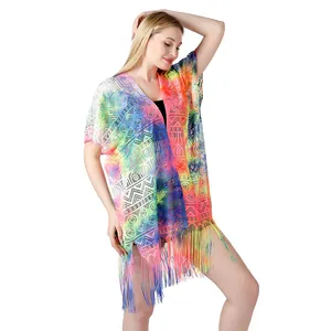 Detailed look at the intricate lace patterns and vibrant tie-dye colors of the cover-up