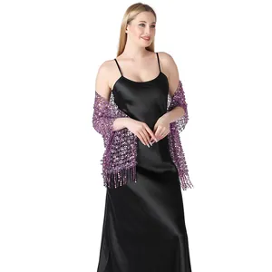Close-up of elegant purple sequin embroidered shawl with fringe detailing for evening party