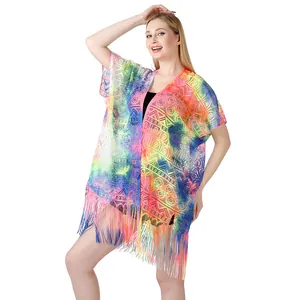 Detail of colorful tie-dye lace bikini cover-up with tassel fringe for beachwear