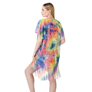 Back view of a vibrant colorful tie-dye lace bikini cover-up featuring long stylish fringes