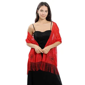 Elegant red lace evening shawl with fringe tassels on a model with black dress