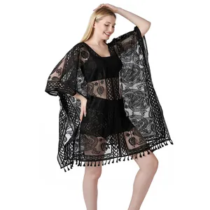 Elegante zwarte kanten strand cover-up met ingewikkelde patronen en een kwastjes zoom