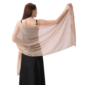 Detailed back view of champagne chiffon shawl with silver silk and rhinestones for evening wear
