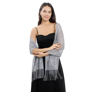 Detailed view of silver floral lace evening shawl with fringe for wedding parties