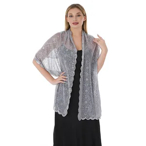 Elegant silver lace shawl with sequin plum blossom embroidery over a black evening dress