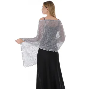 Detailed back view of an elegant silver lace shawl with floral sequin embroidery
