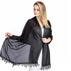 Black sheer chiffon wedding dress shawl with elegant lace fringe trim on model