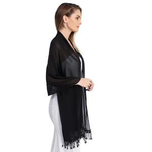 Side view of elegant black chiffon wedding shawl with tassel fringe for evening dress