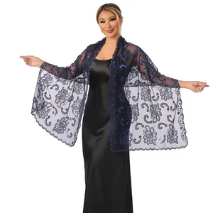 Close-up of an elegant navy blue sequined lotus floral embroidered shawl on a model