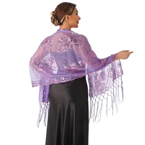 Detailed view of purple sequined floral shawl with elegant tassels for parties