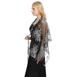 Elegant black sheer shawl with silver sequin embroidery and tassels for evening party