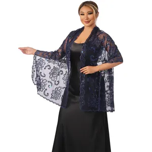 Detail of navy blue lace shawl featuring elegant sequin embroidered lotus flower pattern.