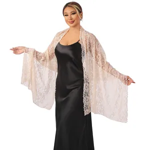Elegant apricot lace shawl wrap featuring intricate floral embroidery and scalloped edges